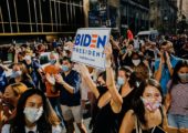 Residents cheer and swarm Broad Street in downtown Philadelphia in celebration of President-Elect Joe Biden winning the presidency in Philadelphia, Pennsylvania on Saturday, November 7, 2020.